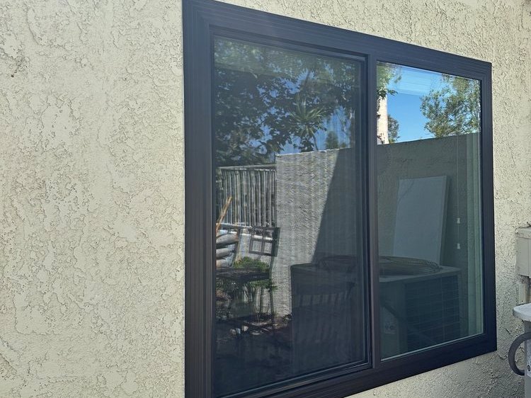 Eterior Architectural Bronze Patio Door and Window Installation in Orange