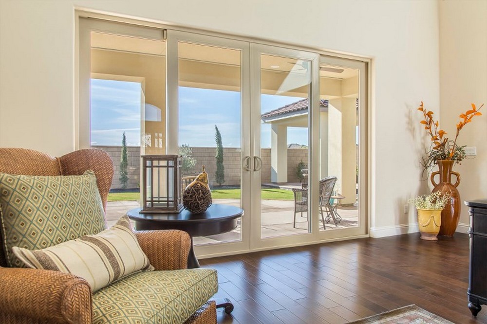 Four-panel patio doors offer the perfect blend of style and practicality, allowing you to enjoy seamless outdoor access while filling your home with natural light and fresh air.